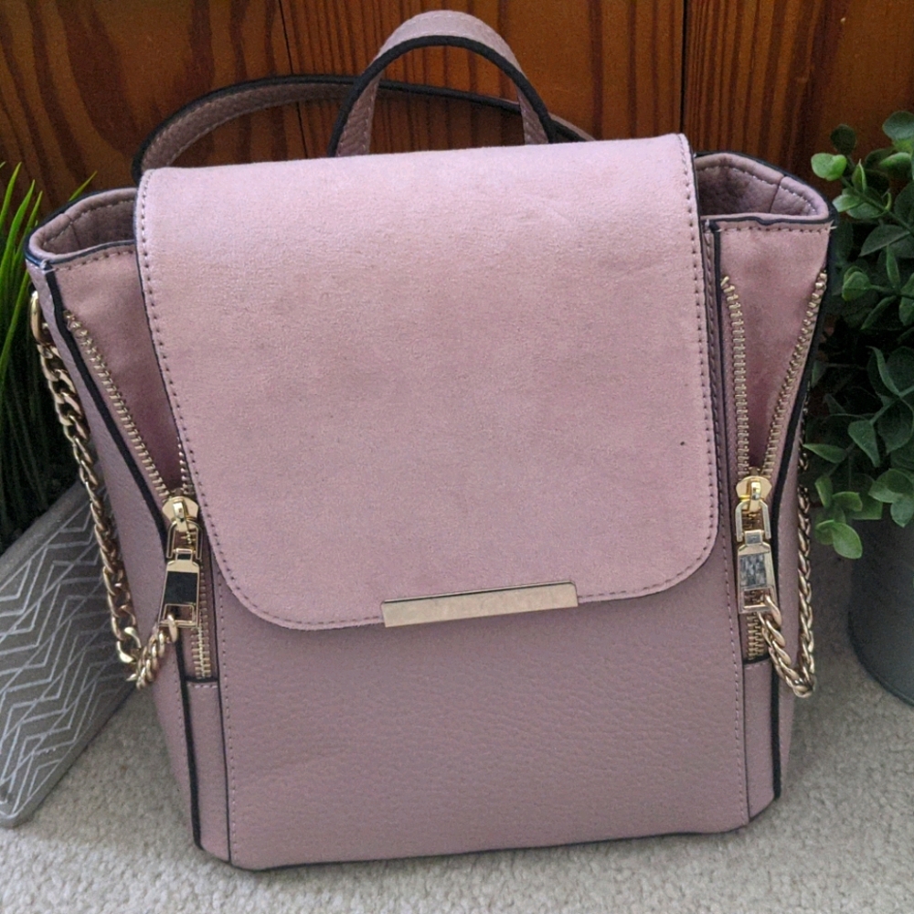Light pink 'call it spring' mini backpack purse.